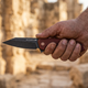 Spartan folding knife in hand