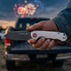 Merica folding knife in hand