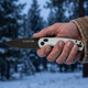 Lone Wolf folding knife in hand